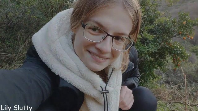 Nerdy girl pissing outdoors