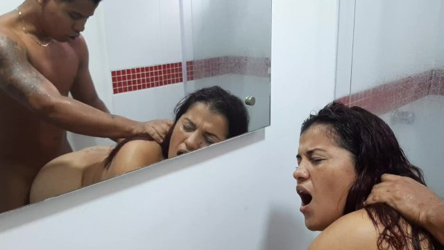 My stepmom comes in while I'm taking a shower and we end up fucking