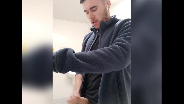 Masculine Guy Has Intense Orgasm in Public Bathroom