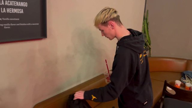 Two guys fuck and kiss in a public toilet in a cafe