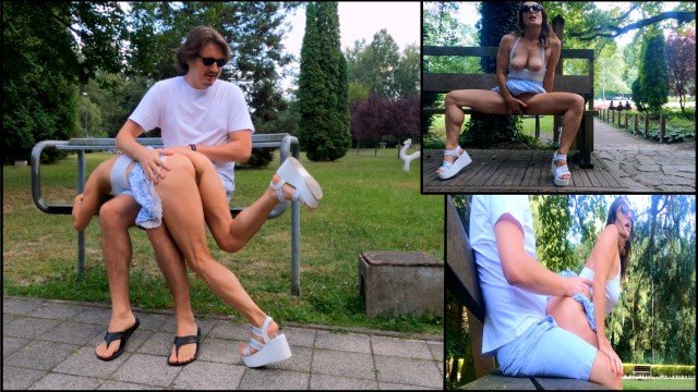 Risky fucking and ass spanked on a park bench among people