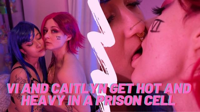 Handcuffed esbians rough each other up in a prison cell and kiss with tongue
