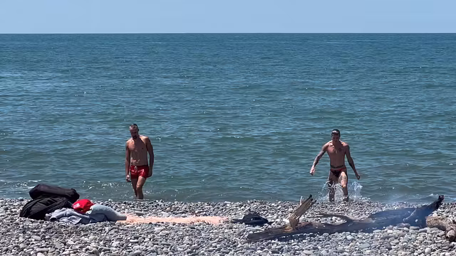Hot guys fucking hard on a public beach