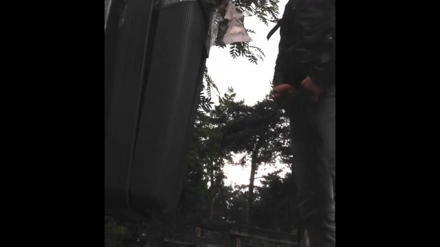 Pissing in Public against a Dustbin