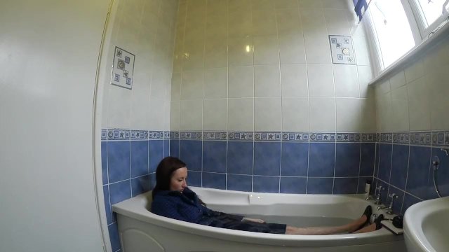 Estate Agent Takes A Dip Fully Clothed