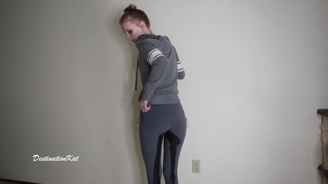 Horny wetting girl in a grey leggings