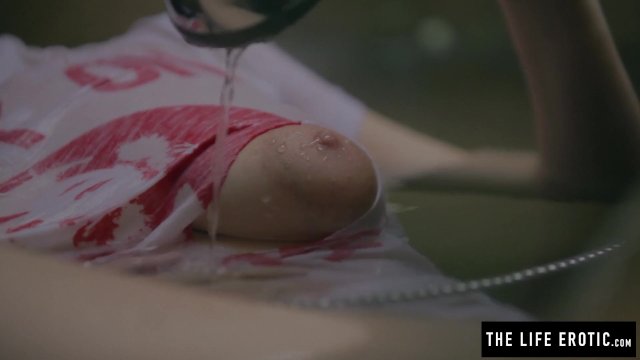 Puffy nippled girl masturbates with a while half 
