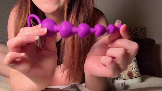 Cheerleaders perfect ass penetrated by anal beads