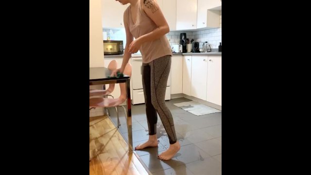 Casually wetting in the kitchen