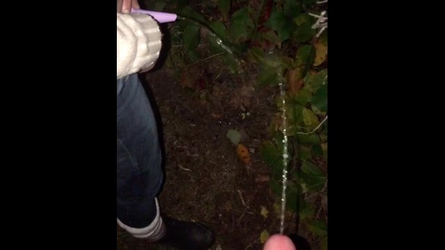 Wife & I pee together outside near our campsite. She uses her GoGirl / Shewee to pee while standing