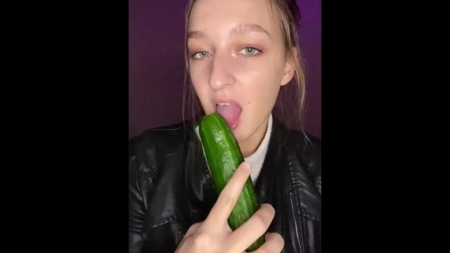 Cucumber sucking. Leather jacket