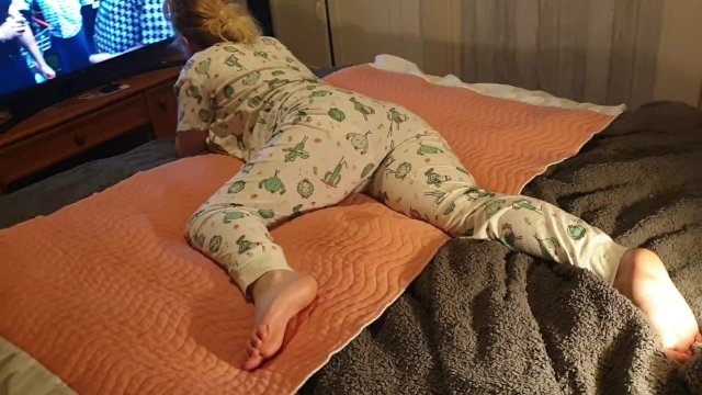 ⭐ Cute Lazy Girl Wets Her Pyjamas Watching TV Lying On Her Tummy!