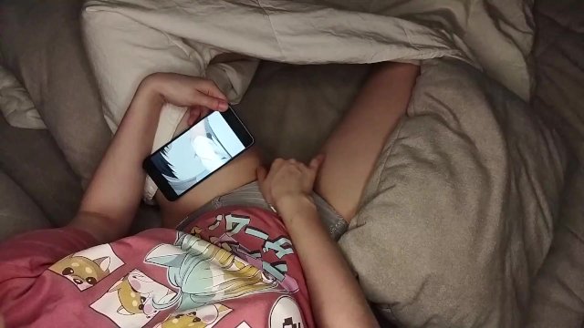 cute schoolgirl masturbates while watching hentai