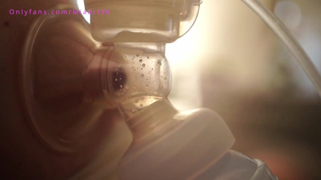Real milking of breasts full of milk